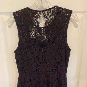 Navy dress with red accent lace overlay